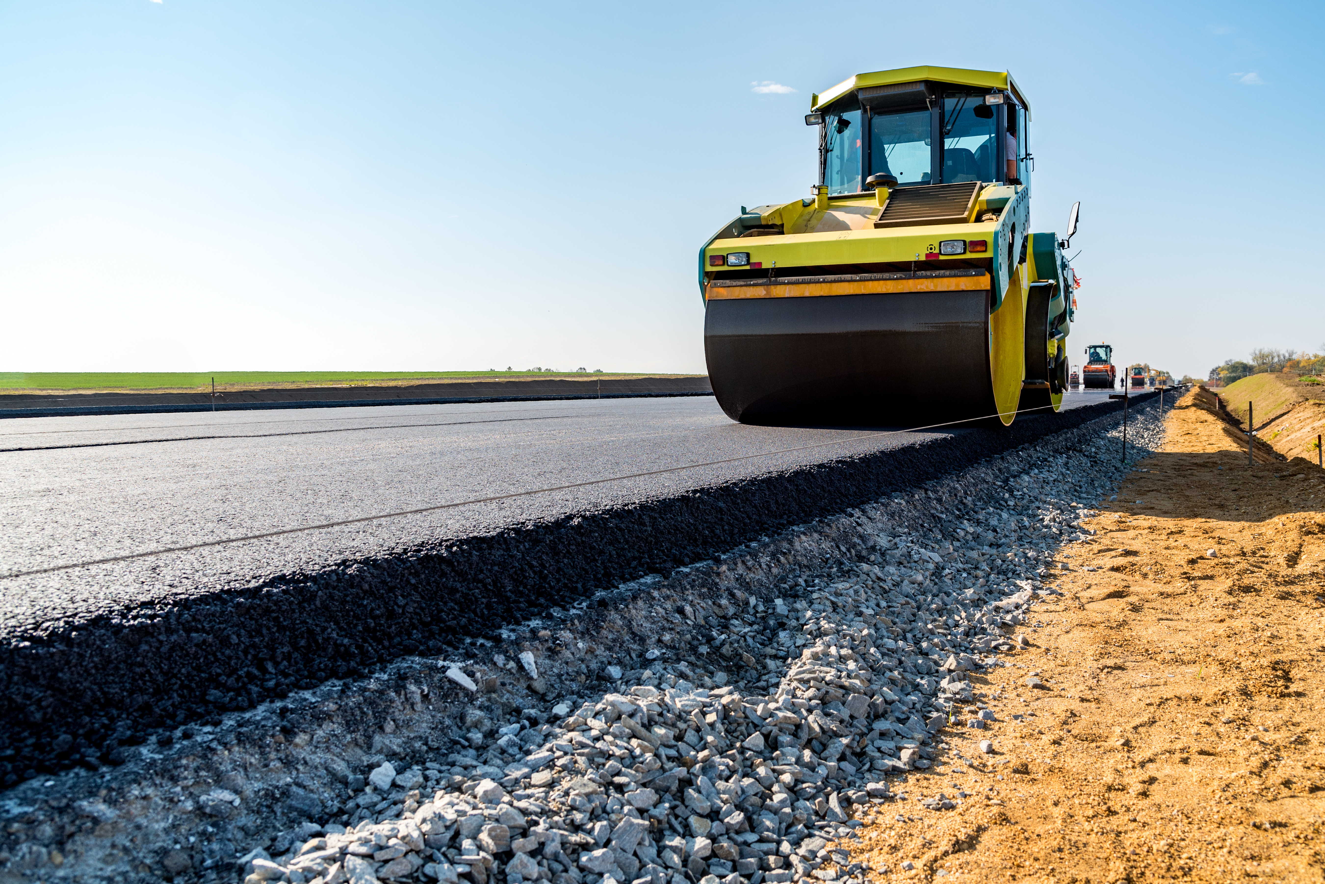 New road construction Road rollers building the new asphalt road